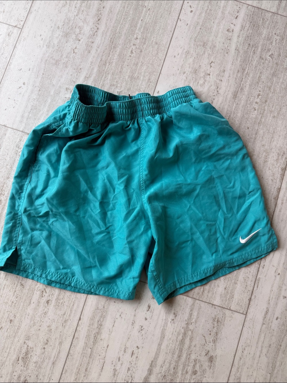 Nike Teal Athletic Shorts with White Swoosh